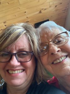 Two women, Leanne and Aggie, smiling at the camera. 